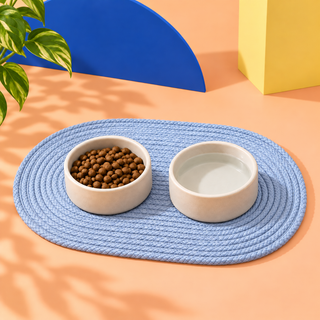 Sky Blue waxed cord dog bowl mat with two bowls on it