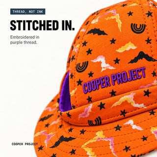 Close-up of the embroidery on the Flying Ghosts Dog Bucket Hat