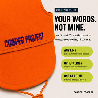 Orange Dog Cap: three lines of your own words, stitched