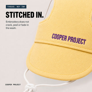 Close-up of the embroidery on the Yellow Dog Cap